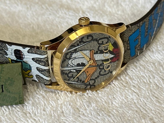 Image 1 of Orologio unisex Gucci G-Timeless YA1264167 Paperino PVD oro 38 mm