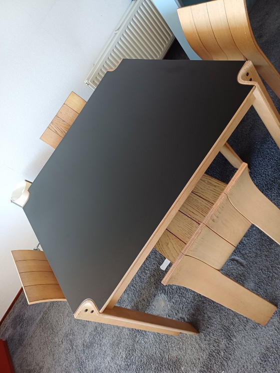 Image 1 of Gijs Bakker, dining area with four strip chairs