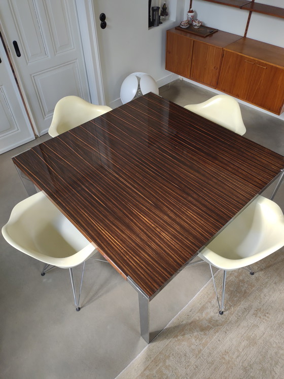 Image 1 of Table Liko Ebony With Heavy Chrome Legs From The Brand Desalto