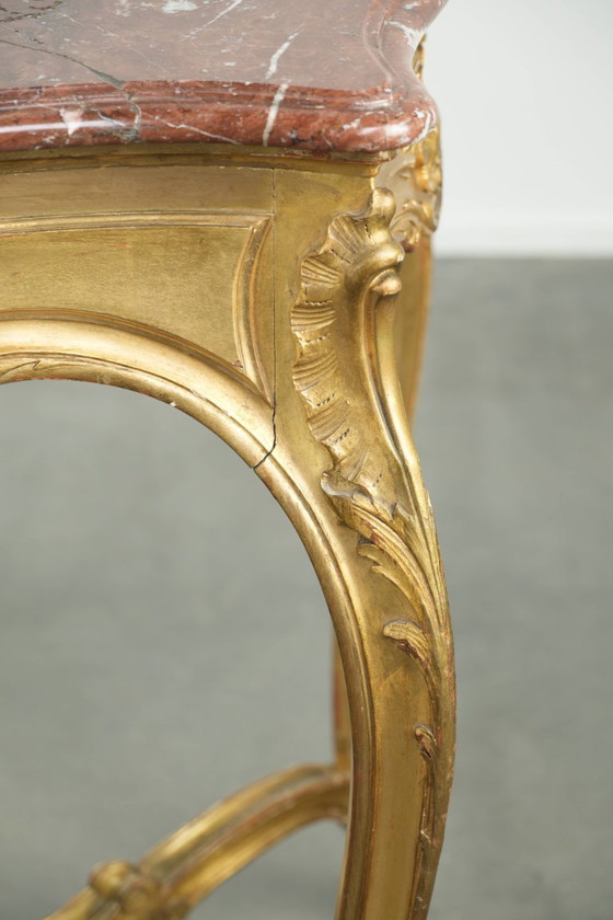 Image 1 of Antique French side table/center table from the 19th century with a gold-colored wooden frame and an original marble tabletop.