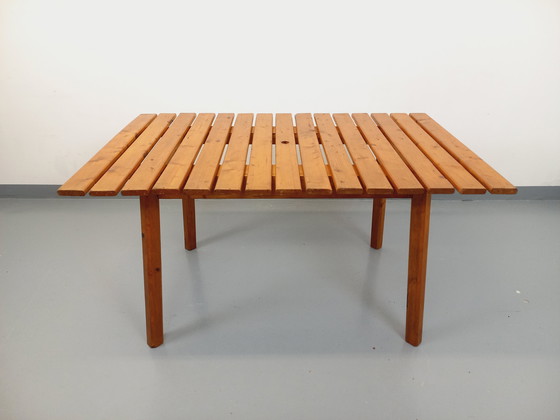 Image 1 of Vintage garden furniture consisting of a table with extensions and 4 wooden armchairs from the 60s