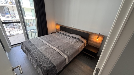 Image 1 of High-quality bedroom set (bed + large wardrobe) – from Loft Interieur Roosdaal (5 years old)