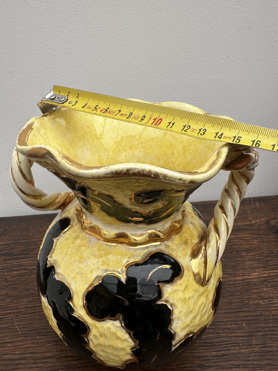 Image 1 of Vase boule jaune et noir rehaussé or attribué Vallauris h 20 cm