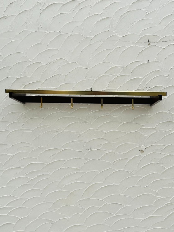 Image 1 of Vintage 1970s wooden and brass wall-mounted coat rack