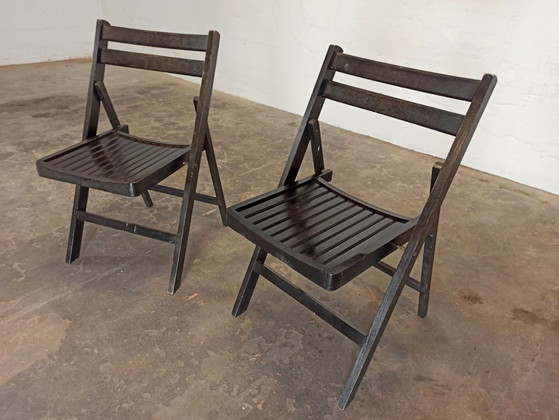 Image 1 of 2 vintage zwarte houten klapstoelen