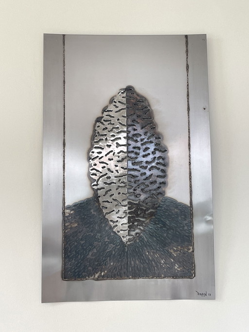 Ruud Termijn - Sembrando una semilla obra de arte en metal