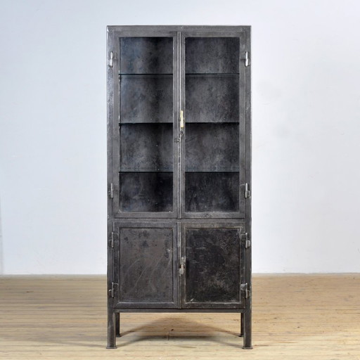 Polished iron medical cabinet, 1920s