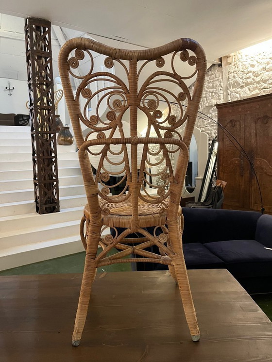 Image 1 of Een paar pauwenrotan stoelen