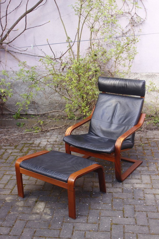 Ikea Vintage - Ikea POÄNG recliner and footstool in black leather, Scandinavian design, 1990s