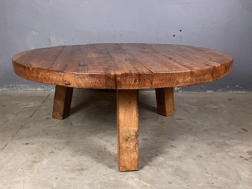 Brutalist eiken salontafel rond driepoot vintage 