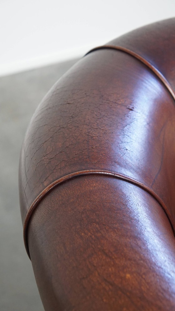 Image 1 of Sheep Leather Club Chair in a Dark Cognac Color