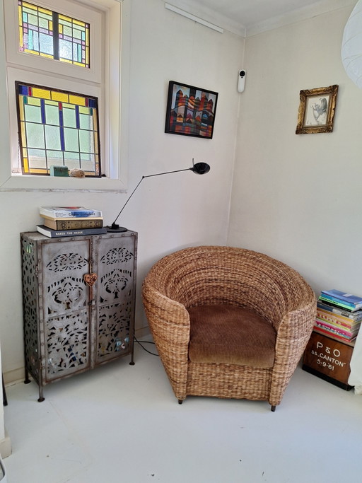 Silla de salón vintage única de gran tamaño con forma de hoja de plátano.