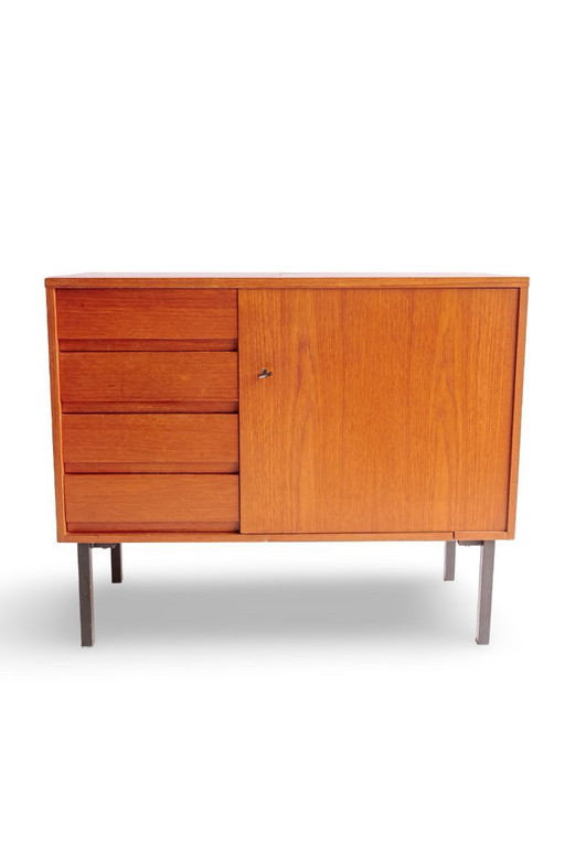 Vintage sideboard with drawers and door