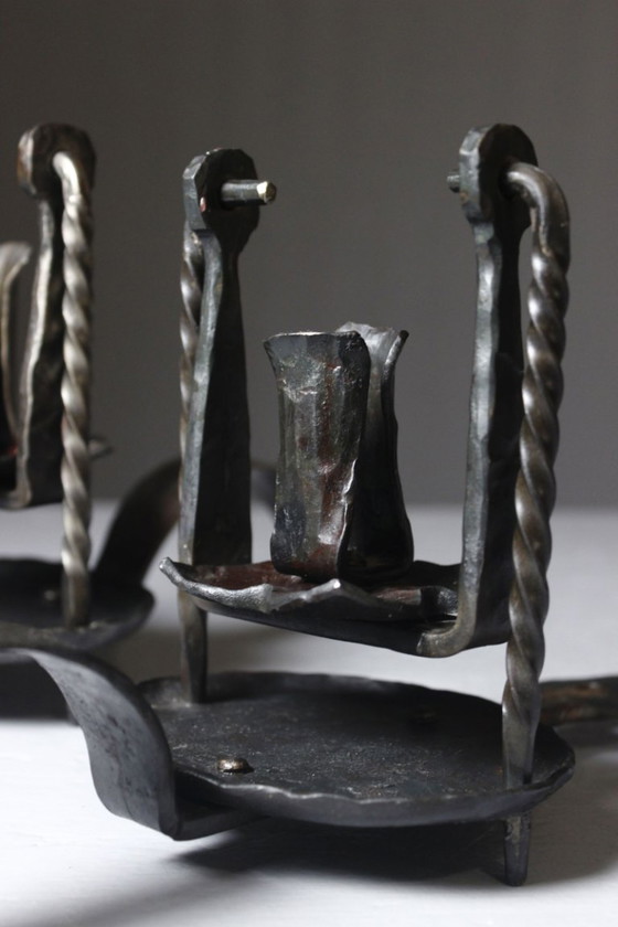 Image 1 of Pair of wrought iron castle-style wall sconces with candles, mid-20th century