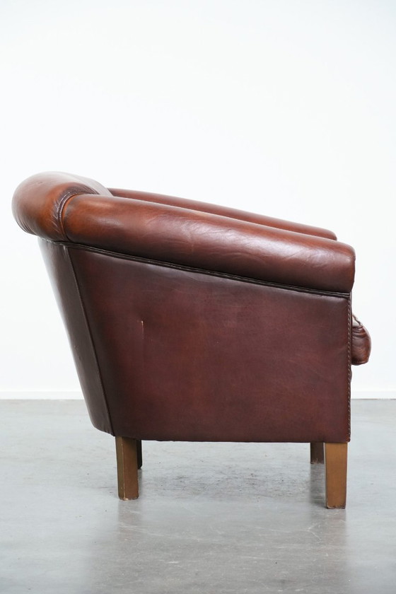 Image 1 of Vintage schapenleren clubfauteuil met siernagels