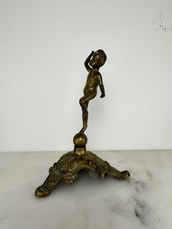 Image 1 of Antique bronze figurine of playing child - decorative and rare