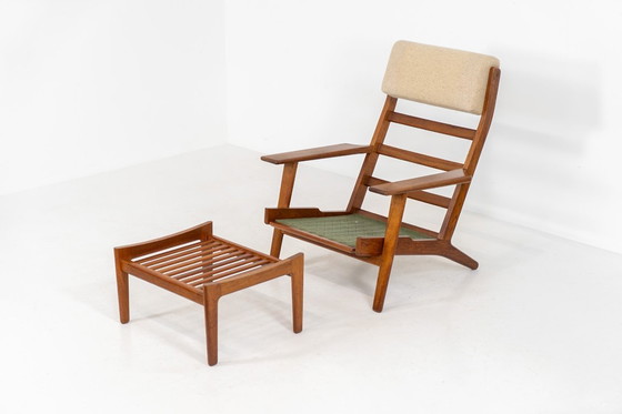 Image 1 of Early GE-290A lounge chair + ottoman in oak by Hans J. Wegner for Getama (Denmark, 1953).