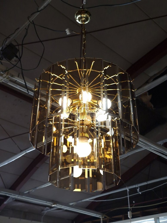 Image 1 of Lustre XL vintage en laiton et verre fumé des années 70