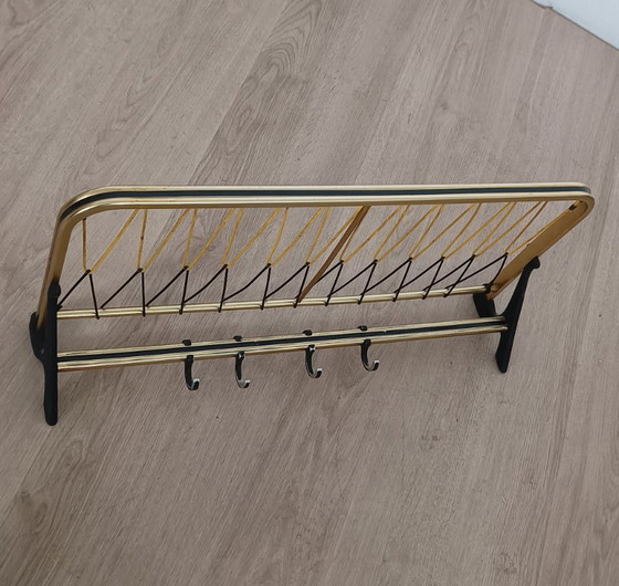 Distinctive 1950s string coat rack – Metal, Plastic (photo 2 of 10)