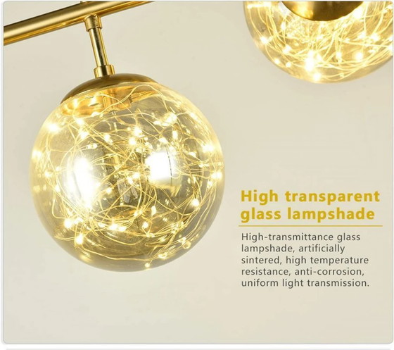 Image 1 of Lámpara de araña Dahlia con 6 bolas doradas estilo guirnalda para el comedor