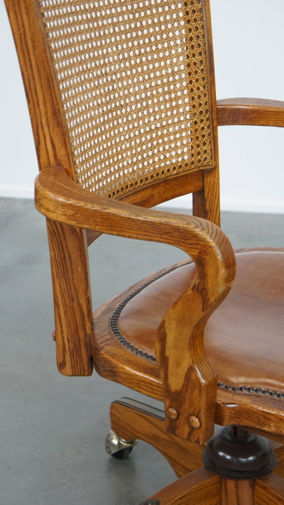 Image 1 of Cognac Colored Leather Office Chair on Wheels with Wood and a Wicker Matted Backrest