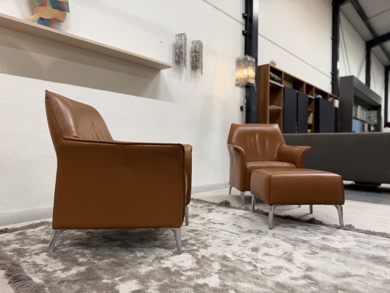 2 Poltrone Leolux Mayuro con pouf Pelle marrone, Arancione (foto 5 di 9)