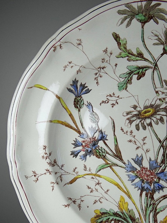Image 1 of Antique Longchamp deep dish with polychrome ironstone daisies