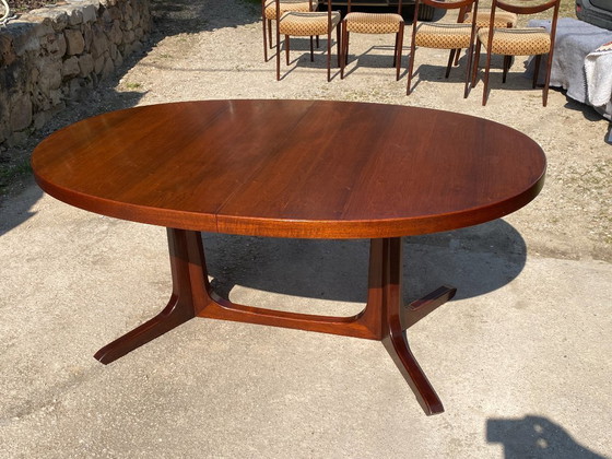 Image 1 of Baumann round oval extendable Scandinavian table in rosewood with 2 extensions, length 166 to 256cm, an60