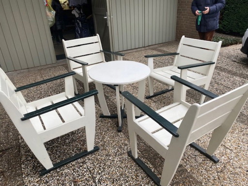 Set da giardino composto da 4 sedie e tavolo coordinato in legno bianco/ecru e verde scuro, stile L'Aia