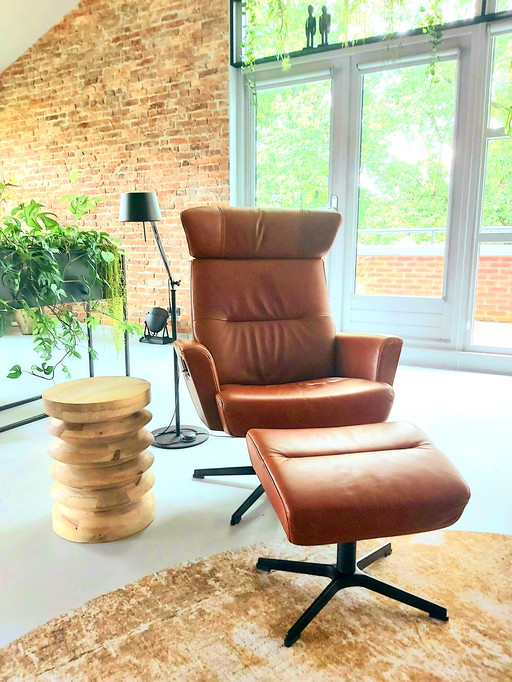 Relax armchair in cognac leather with footstool