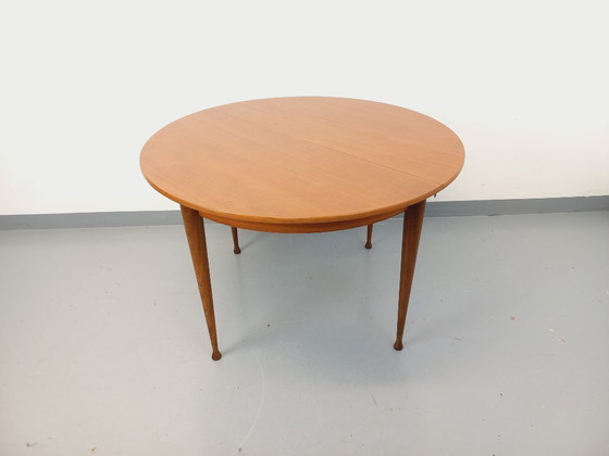 Image 1 of Vintage Scandinavian style round teak dining table from the 1950s/60s with extension