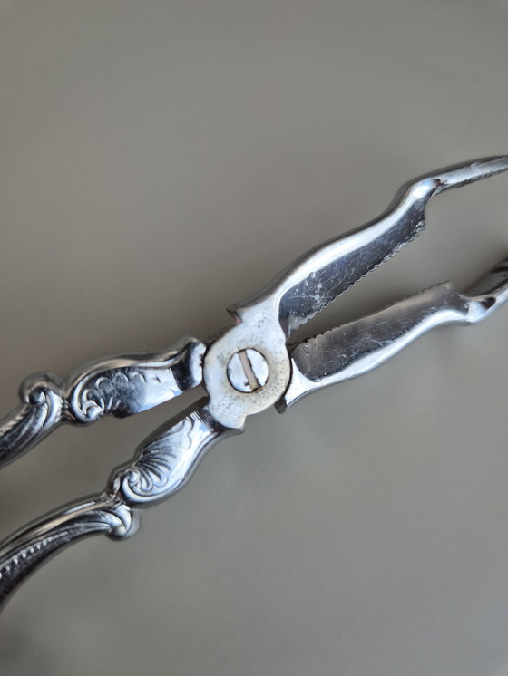 Image 1 of Pinze da portata vintage in metallo cromato - stile barocco decorativo