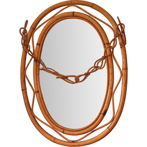 Vintage oval mirror in rattan