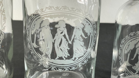 Image 1 of Vintage Engraved Glass and Wood Bottles