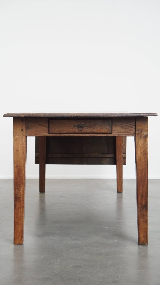 Image 1 of Table de salle à manger ancienne en chêne du début des années 1900 avec plateau rabattable d'un côté