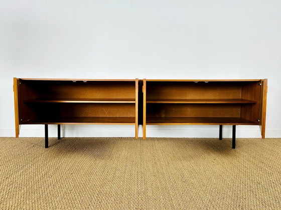 Image 1 of Minimalist Scandinavian sideboard in teak with black metal legs, 1960
