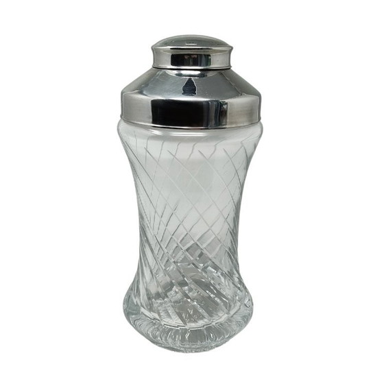 Image 1 of https://madinteriorart.com/collections/tableware/products/1950s-gorgeous-cut-crystal-cocktail-shaker-made-in-italy-copia