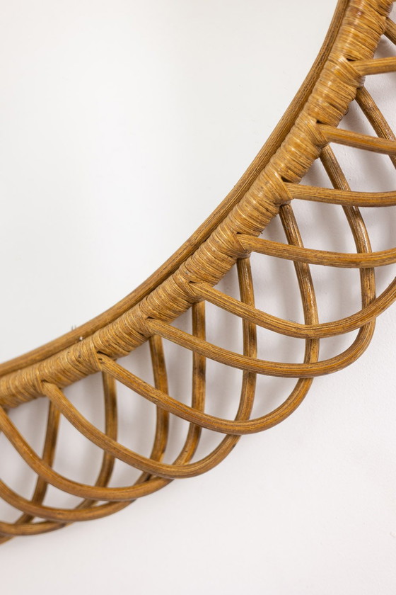 Image 1 of Pair of Round Wicker Mirrors with Interlacing. Circa 1980.