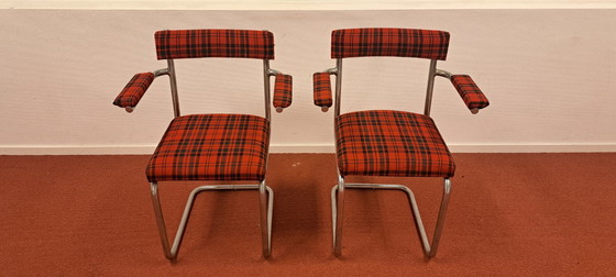 Image 1 of Ensemble de 2 chaises tubulaires avec accoudoirs | style rétro | rouge