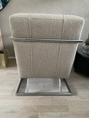 2 armchairs with steel frame and bouclé upholstery