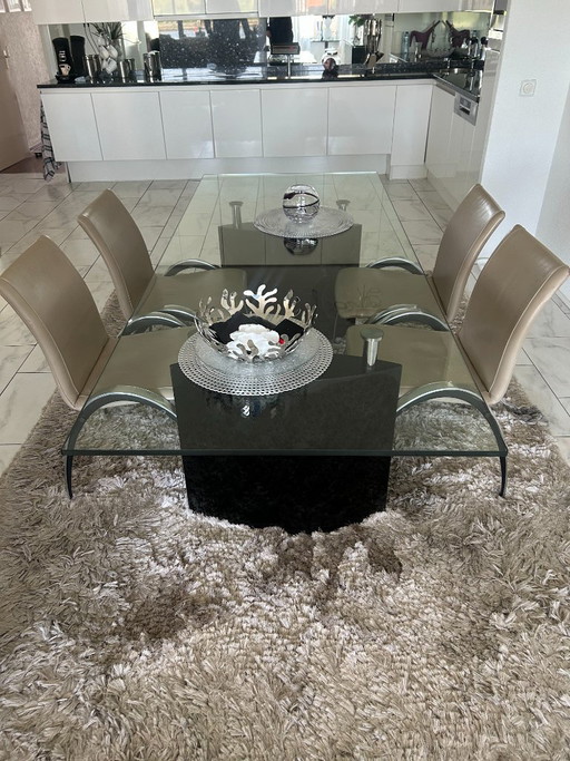 Glass dining table incl. 4 grey leather chairs