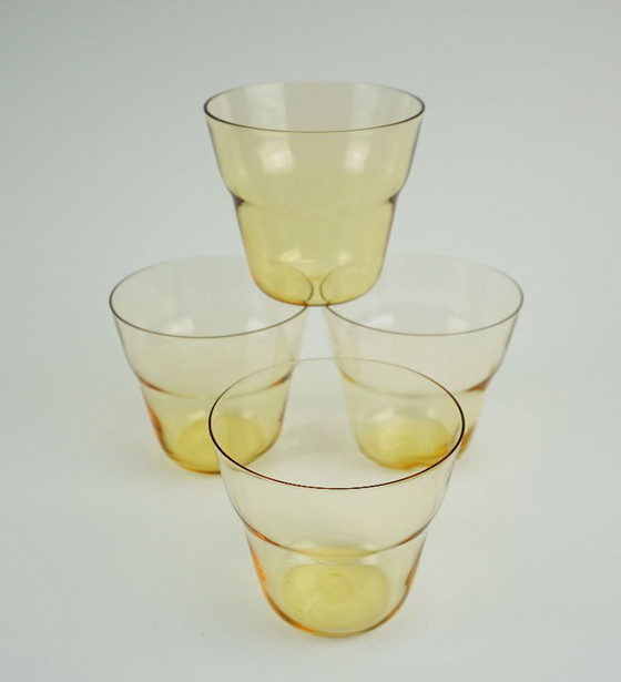 Image 1 of Ensemble de 4 verres à thé style années 50, signés Hein Matten, support en laiton, anses en raphia.