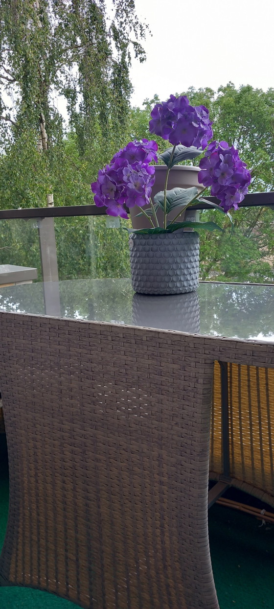 Image 1 of 2-person bistro dining area outside or inside