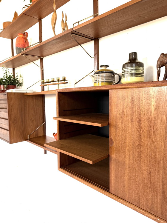 Vintage modulair teakhouten wandsysteem, Poul Cadovius ‘60 – Wandkast, Wood, Brass (photo 15 of 15)