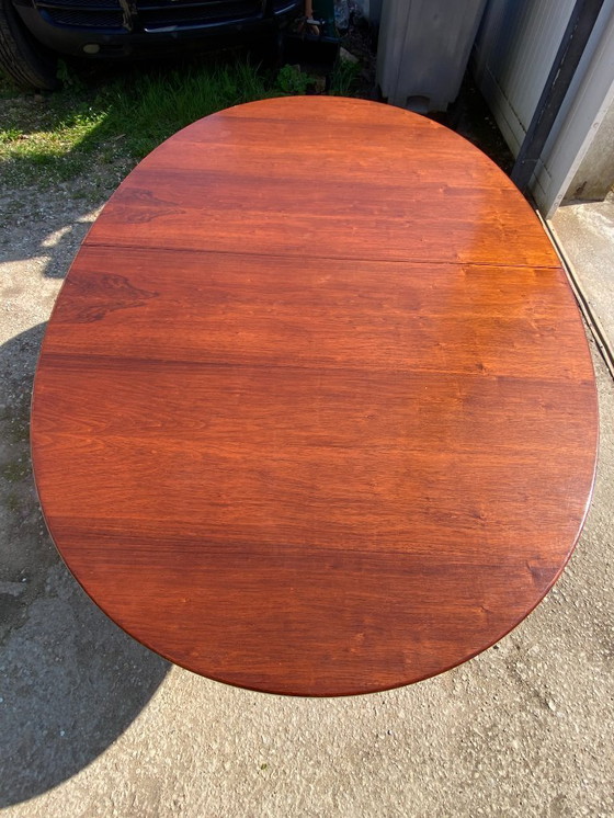 Image 1 of Baumann round oval extendable Scandinavian table in rosewood with 2 extensions, length 166 to 256cm, an60