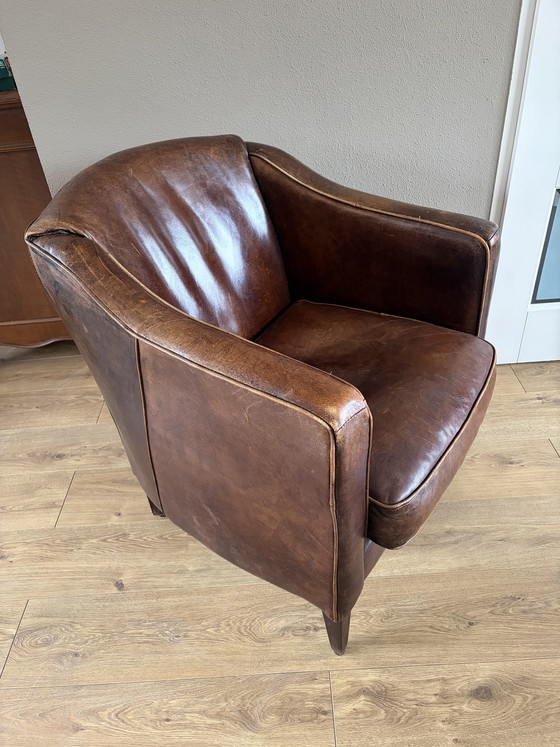 Image 1 of 2 vintage schapenleren clubfauteuils 