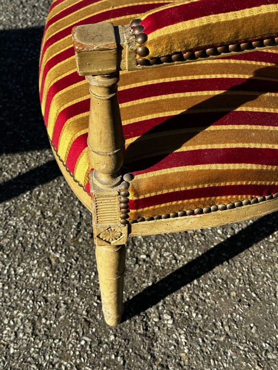 Image 1 of Louis XVI cabrioletfauteuil - Gepatineerd hout en gestreept fluweel