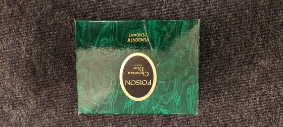 Image 1 of Poison miniature glass bottle pendant by Christian Dior