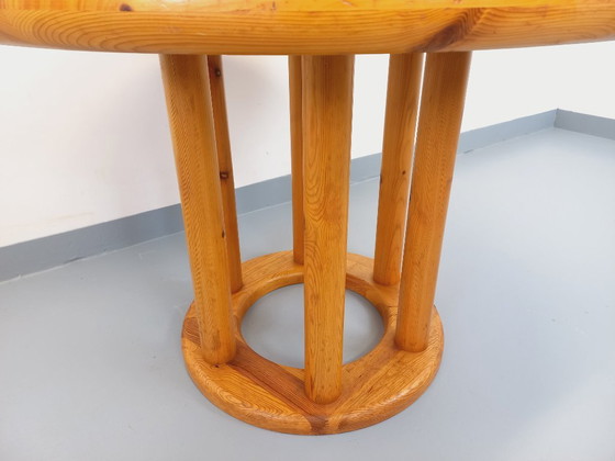 Image 1 of Vintage Scandinavian round dining table by Rainer Daumiller in pine from the 1960s/70s with extensions