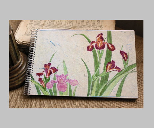 Hand-painted and hand-bound notebooks on handmade paper. Unique designs. Signed by the artist. New.